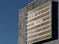 building color:blue color:gray marquee movie_theater rust sky subject:object type:photograph // 2667x2000 // 379KB